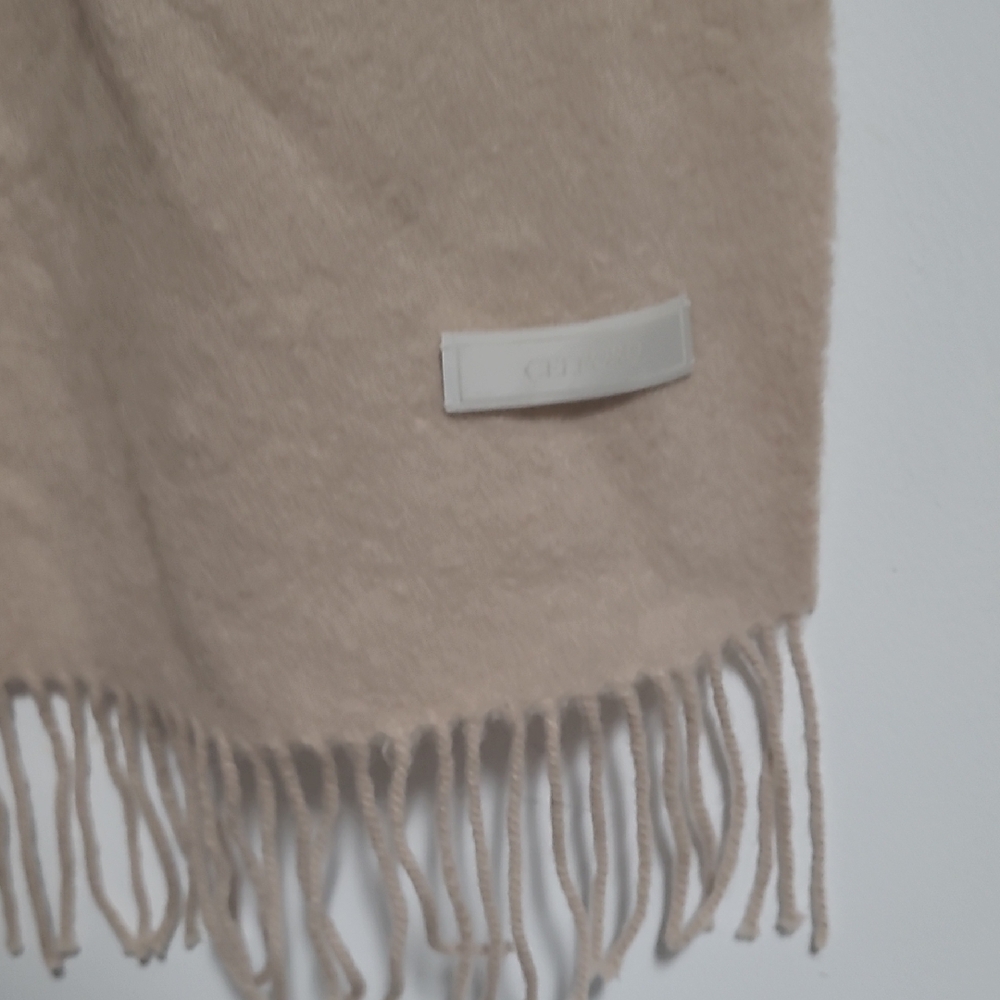 Elegant Beige Scarf with Fringe